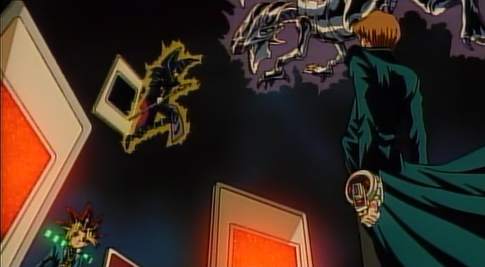 Yami Yugi and Kaiba dueling each other with floating large cards and Black Magician and Blue-Eyes White Dragon in the air about to face off.